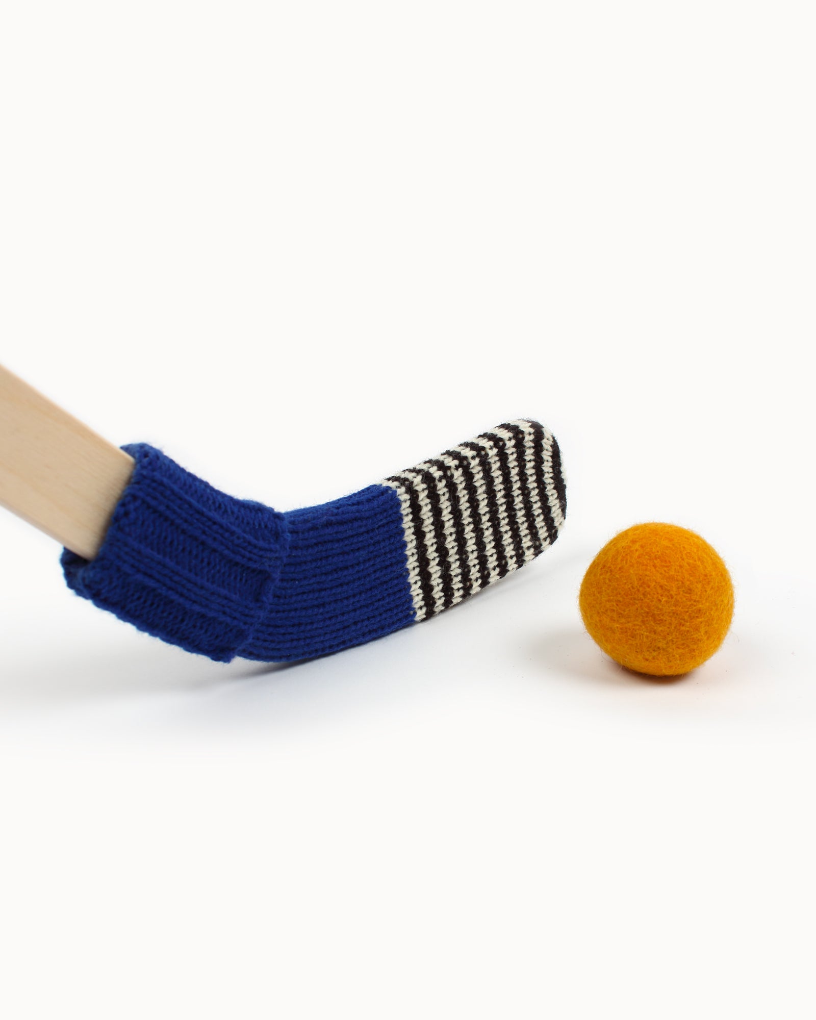 Bâton de hockey ― bleu, noir et crème
